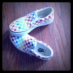 I am selling brain new rainbow checkbord Vans